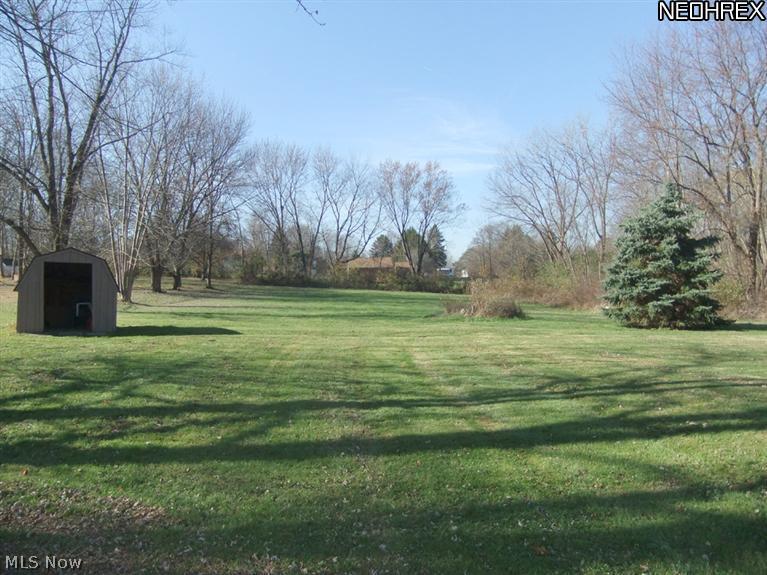 1290 Jacoby Road Akron, OH 44321 - Photo 23 of 24 The shed offers a place for storage of all your yard tools.
