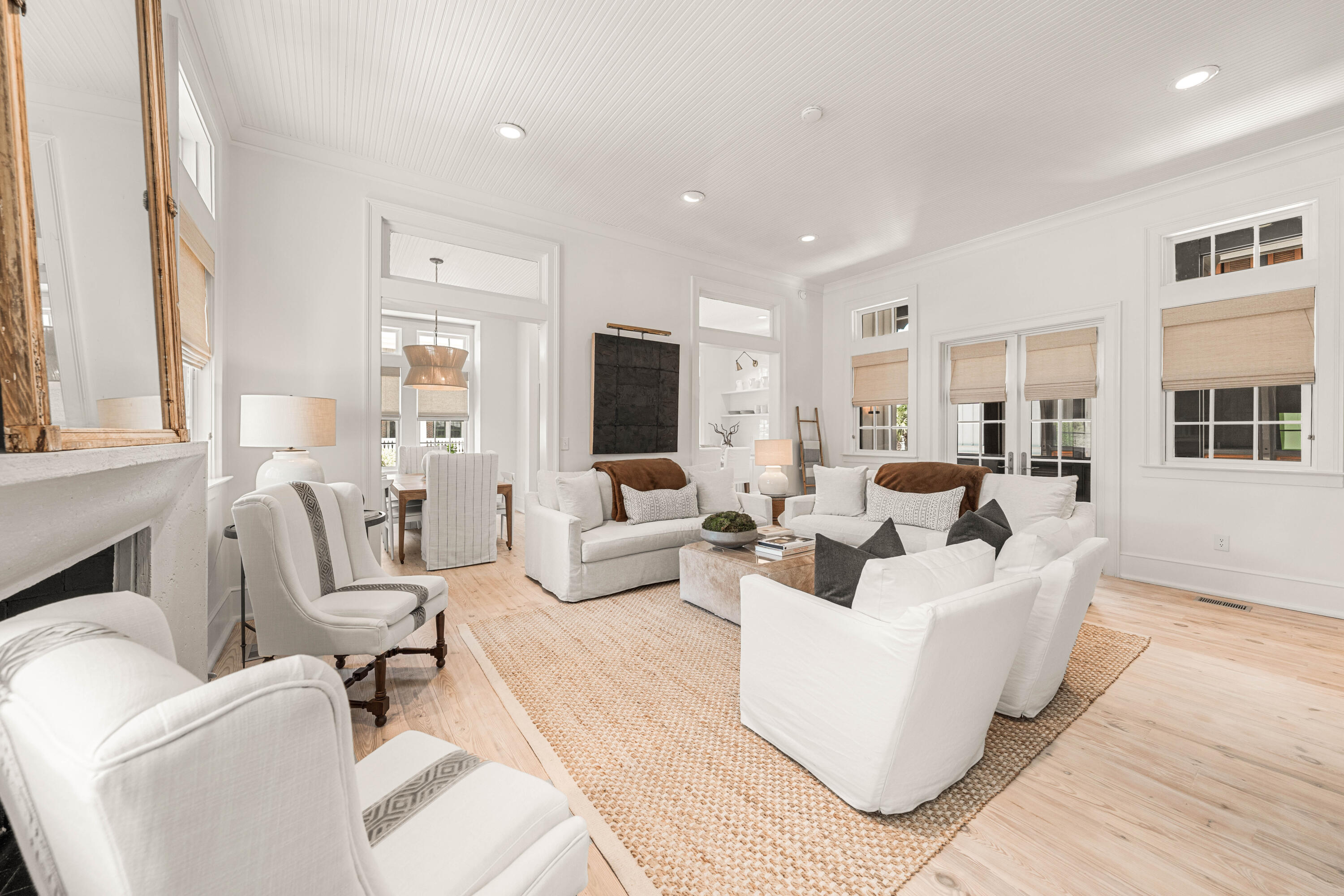 249 Lifeguard Loop East, Unit A3 Inlet Beach, FL 32461 - Photo 13 of 60 a living room with fireplace furniture and a flat screen tv
