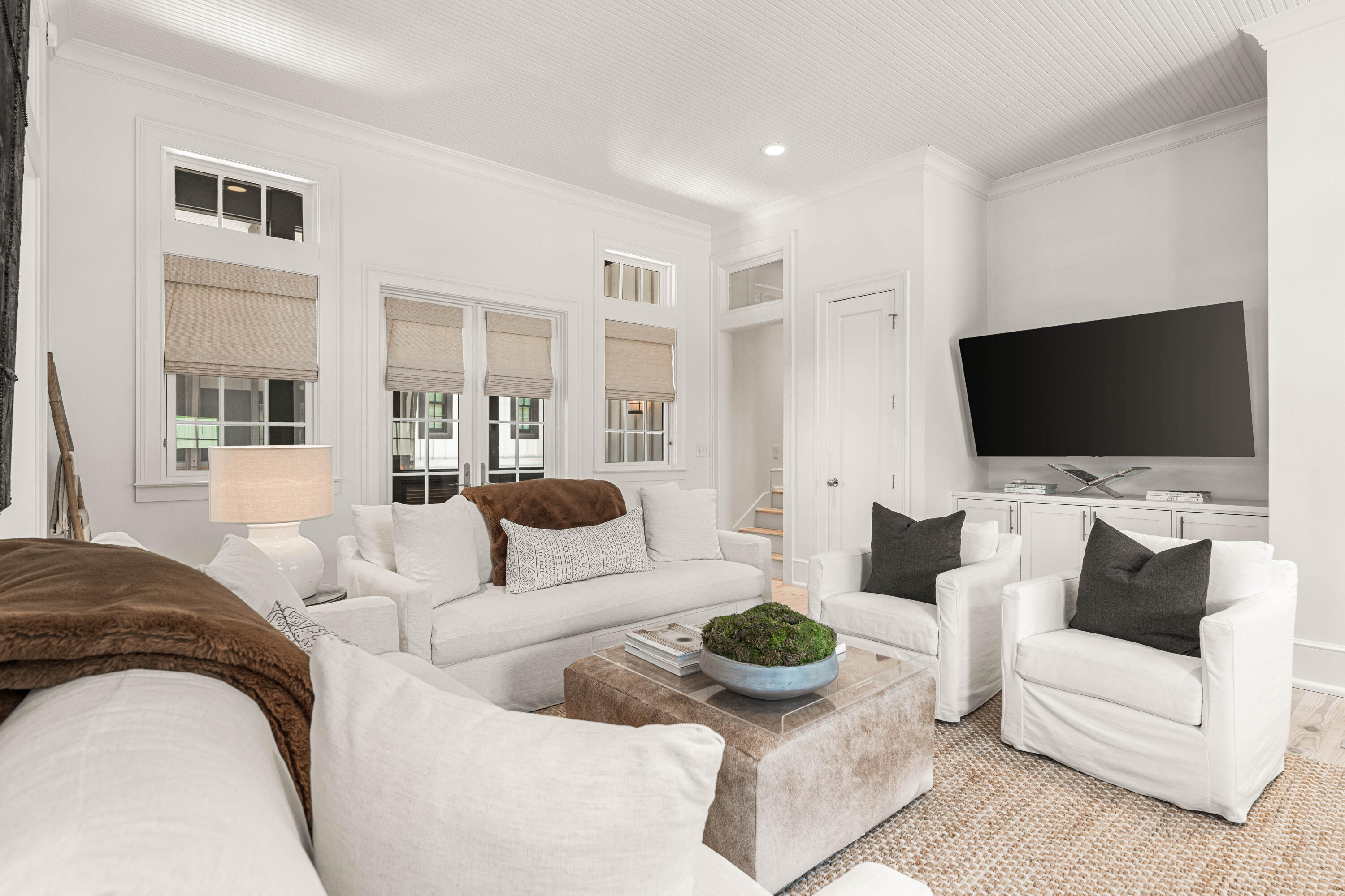 249 Lifeguard Loop East, Unit A3 Inlet Beach, FL 32461 - Photo 17 of 60 a living room with furniture and a flat screen tv