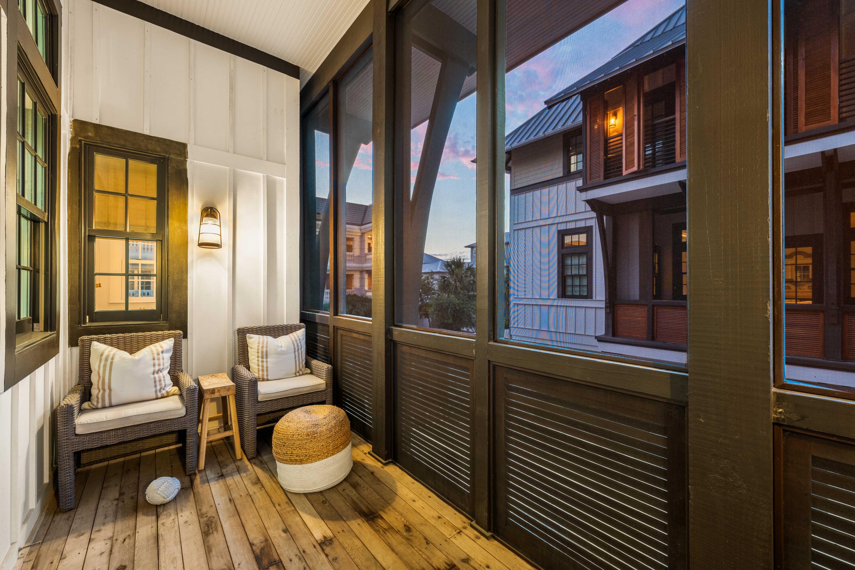 249 Lifeguard Loop East, Unit A3 Inlet Beach, FL 32461 - Photo 20 of 60 a view of a balcony and dining area with furniture
