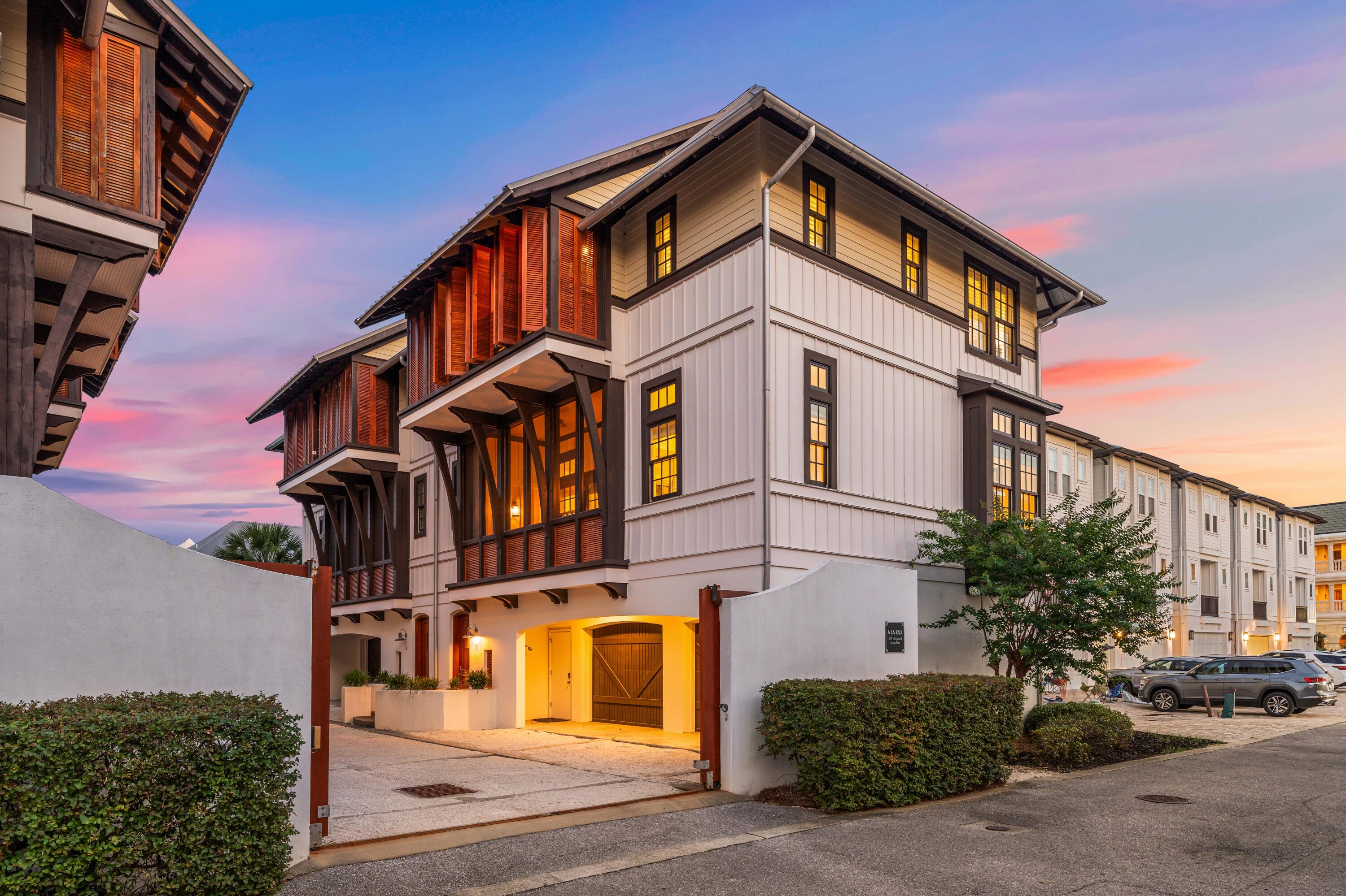 249 Lifeguard Loop East, Unit A3 Inlet Beach, FL 32461 - Photo 2 of 60 a front view of a building with street