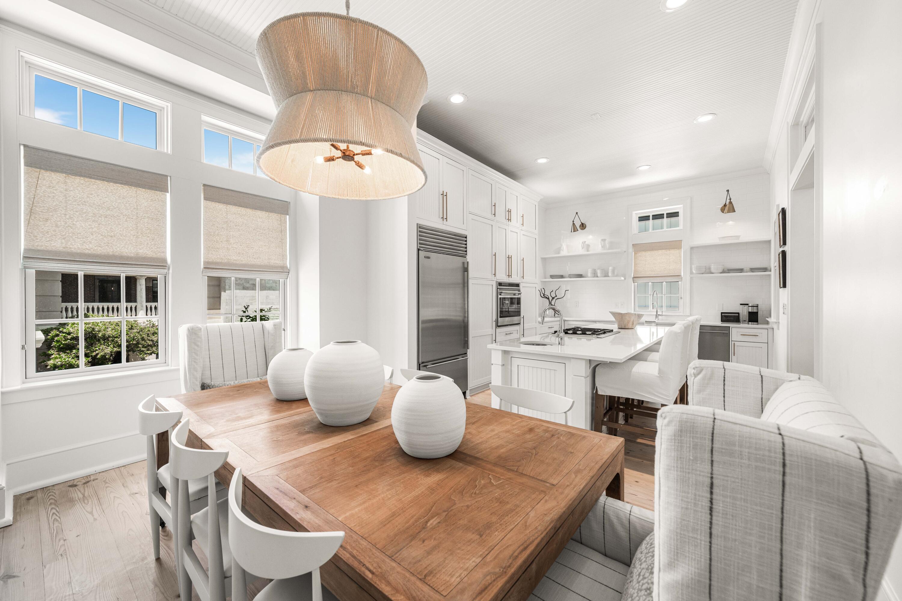 249 Lifeguard Loop East, Unit A3 Inlet Beach, FL 32461 - Photo 22 of 60 a dining room with furniture and window