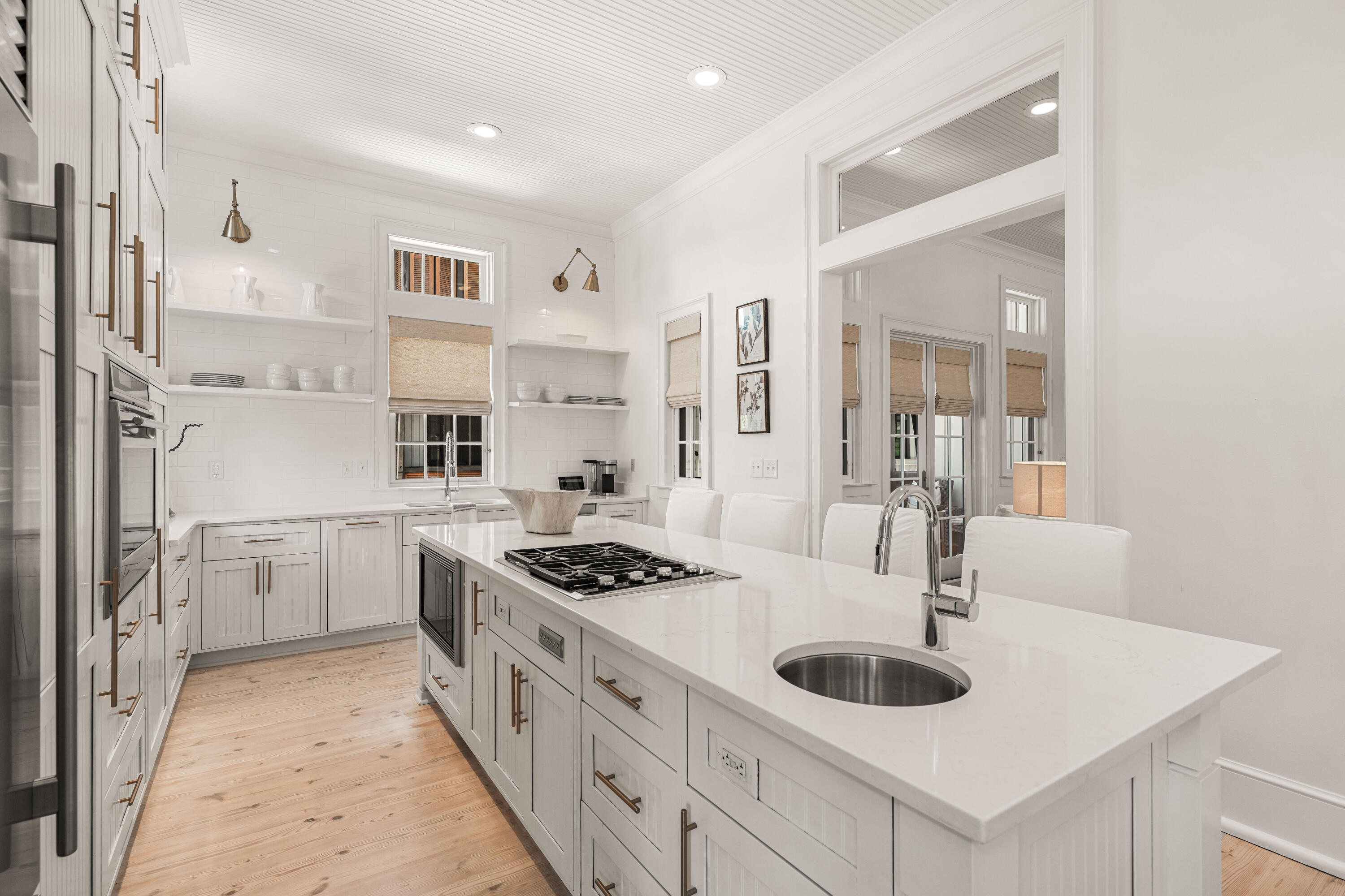 249 Lifeguard Loop East, Unit A3 Inlet Beach, FL 32461 - Photo 24 of 60 a kitchen with stainless steel appliances granite countertop a sink stove and cabinets