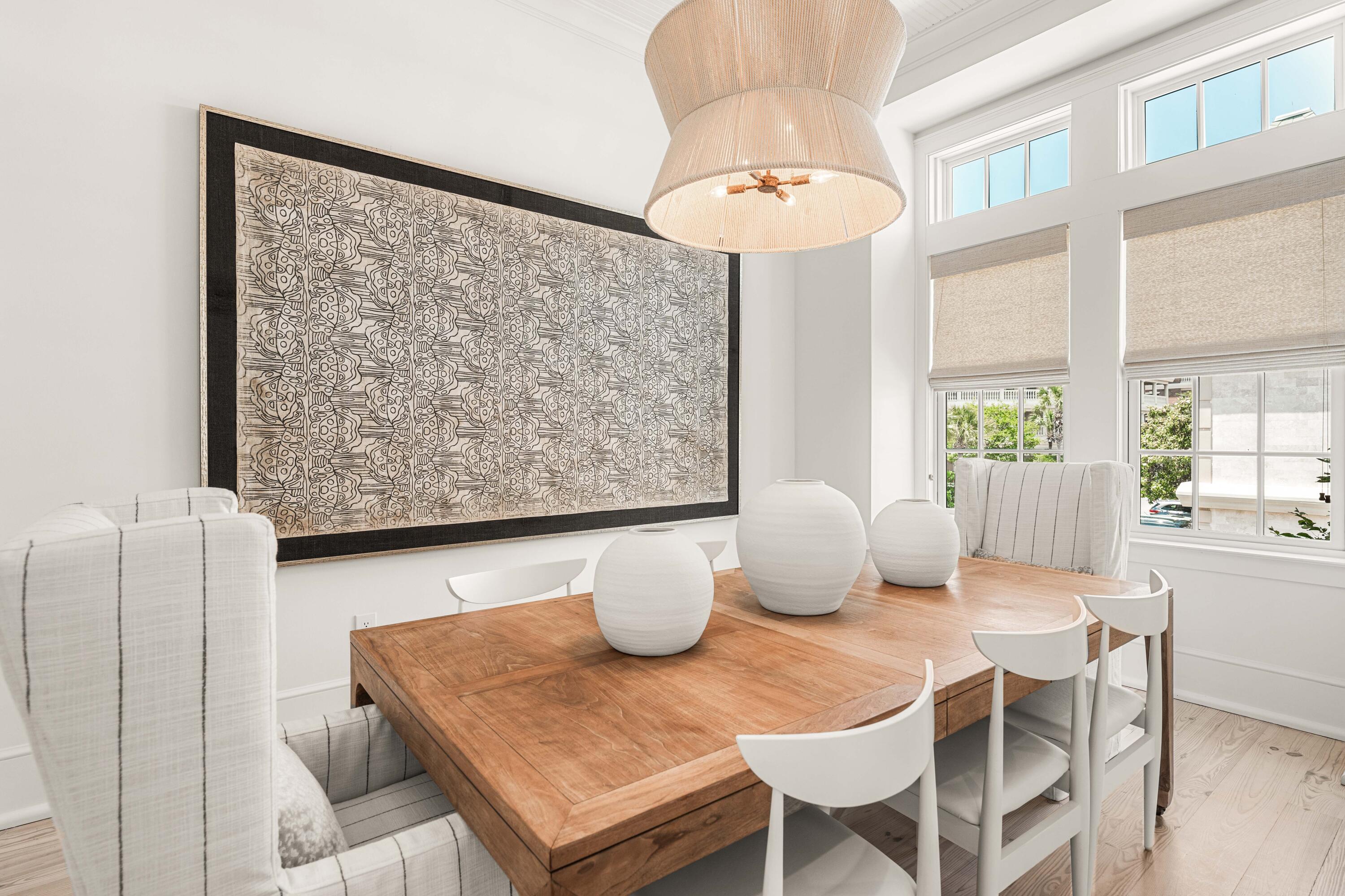 249 Lifeguard Loop East, Unit A3 Inlet Beach, FL 32461 - Photo 25 of 60 a view of a dining room with furniture and wooden floor