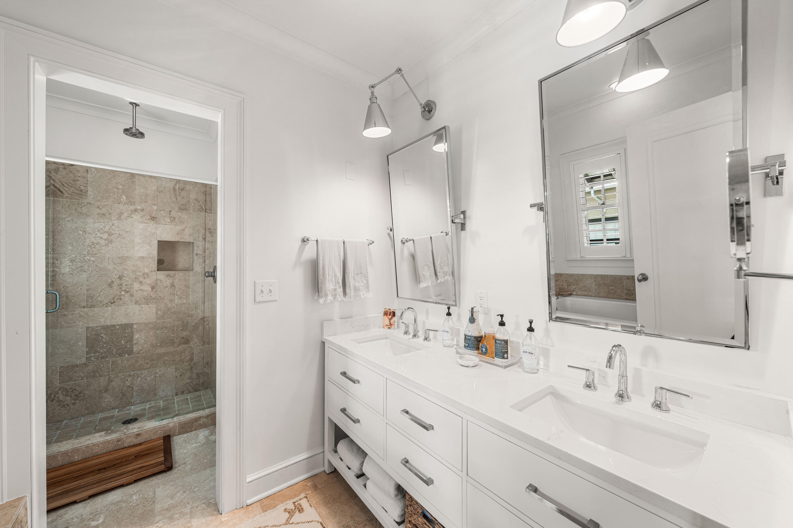 249 Lifeguard Loop East, Unit A3 Inlet Beach, FL 32461 - Photo 37 of 60 a bathroom with a double vanity sink mirror and shower