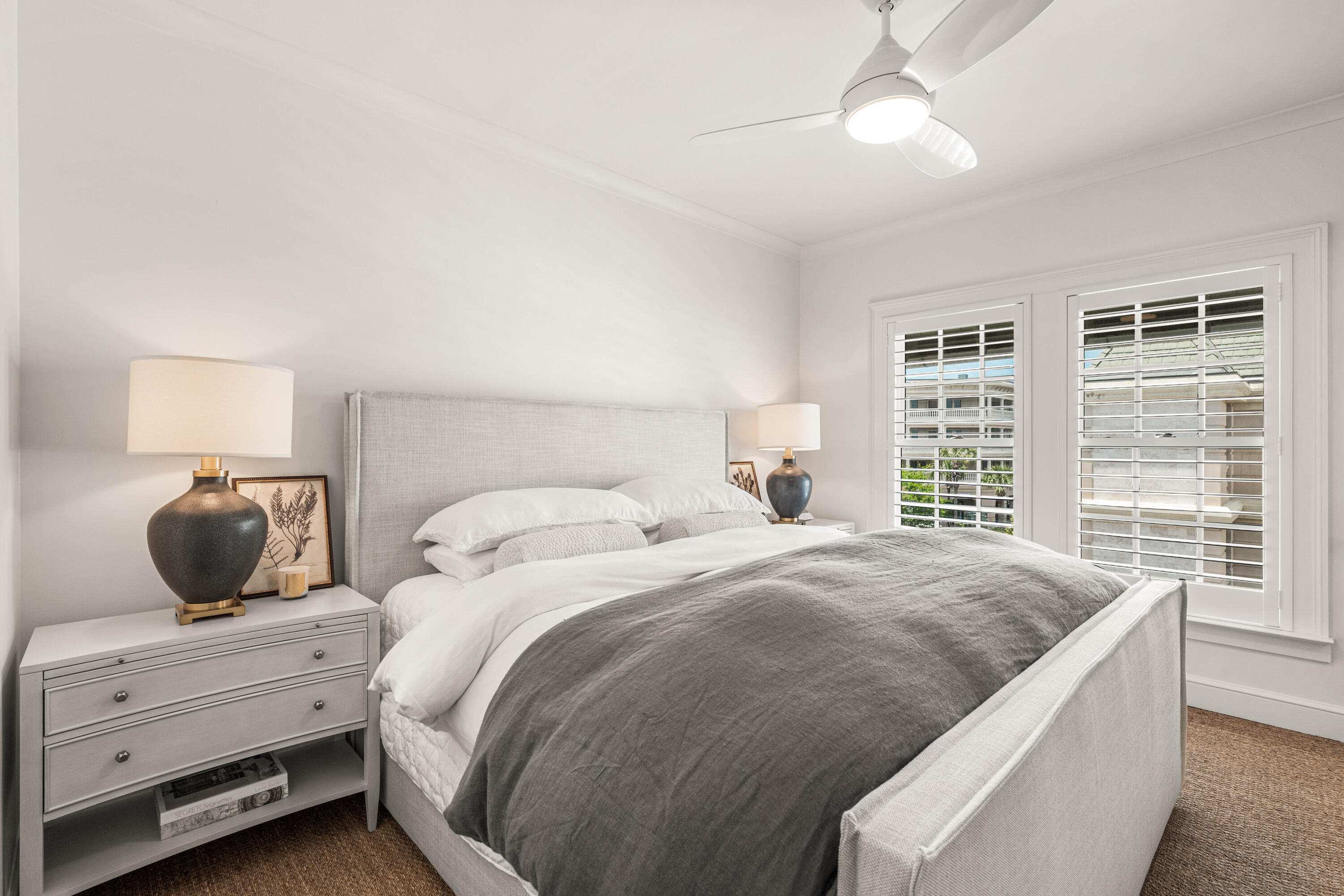 249 Lifeguard Loop East, Unit A3 Inlet Beach, FL 32461 - Photo 40 of 60 a bedroom with a large bed and a window