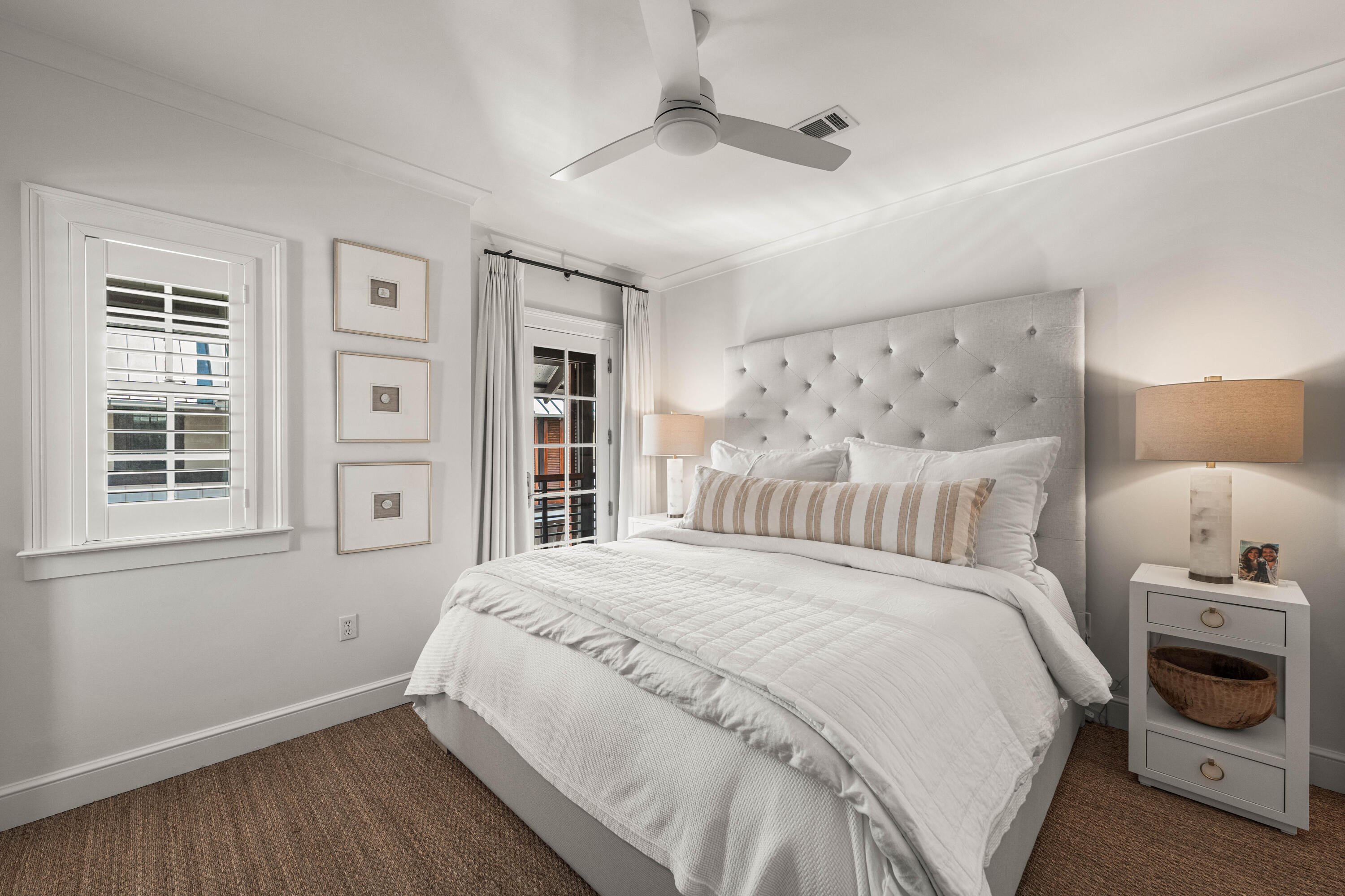 249 Lifeguard Loop East, Unit A3 Inlet Beach, FL 32461 - Photo 44 of 60 a bedroom with a large bed and a window