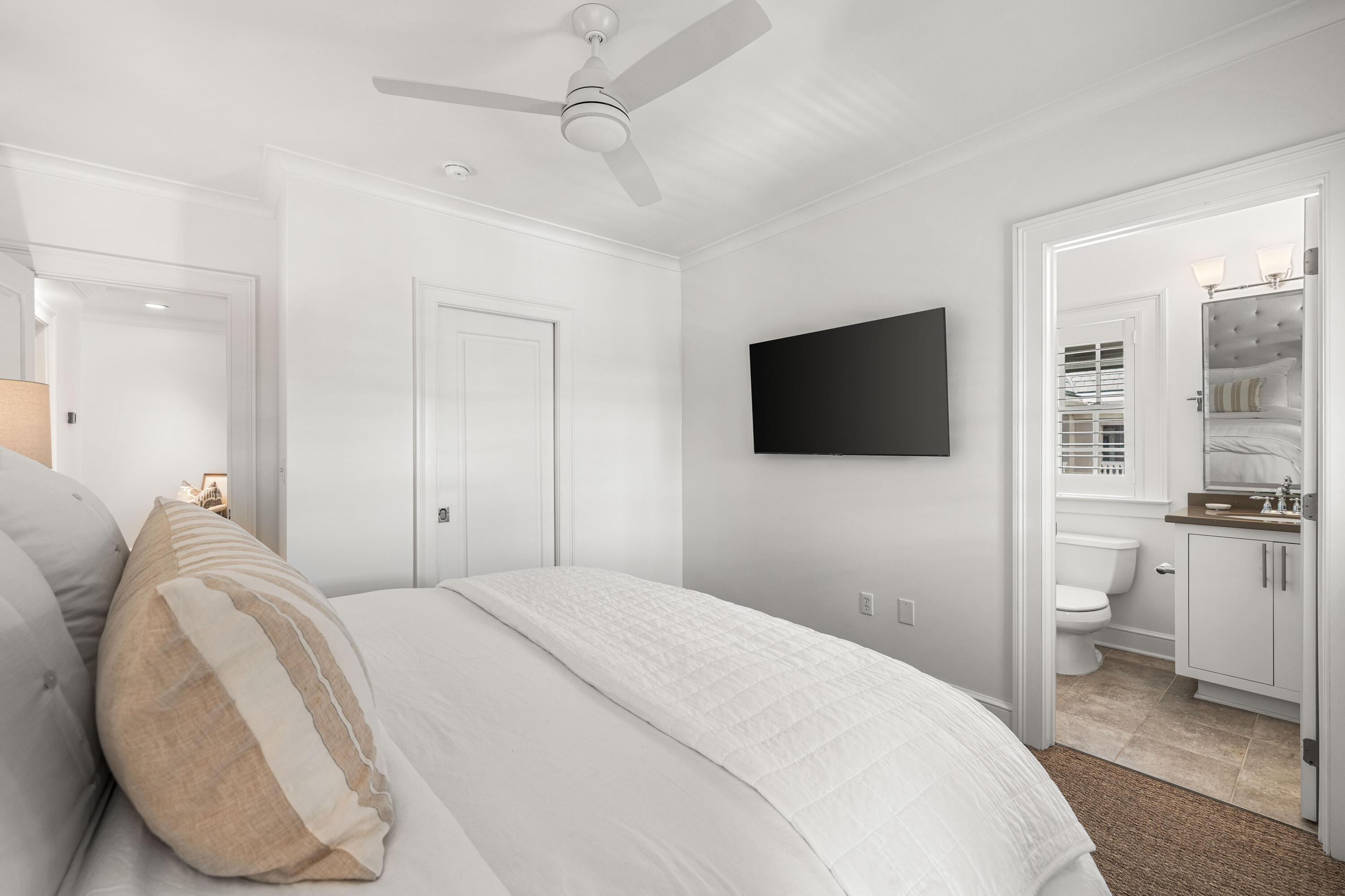 249 Lifeguard Loop East, Unit A3 Inlet Beach, FL 32461 - Photo 45 of 60 a bedroom with a bed and a flat screen tv