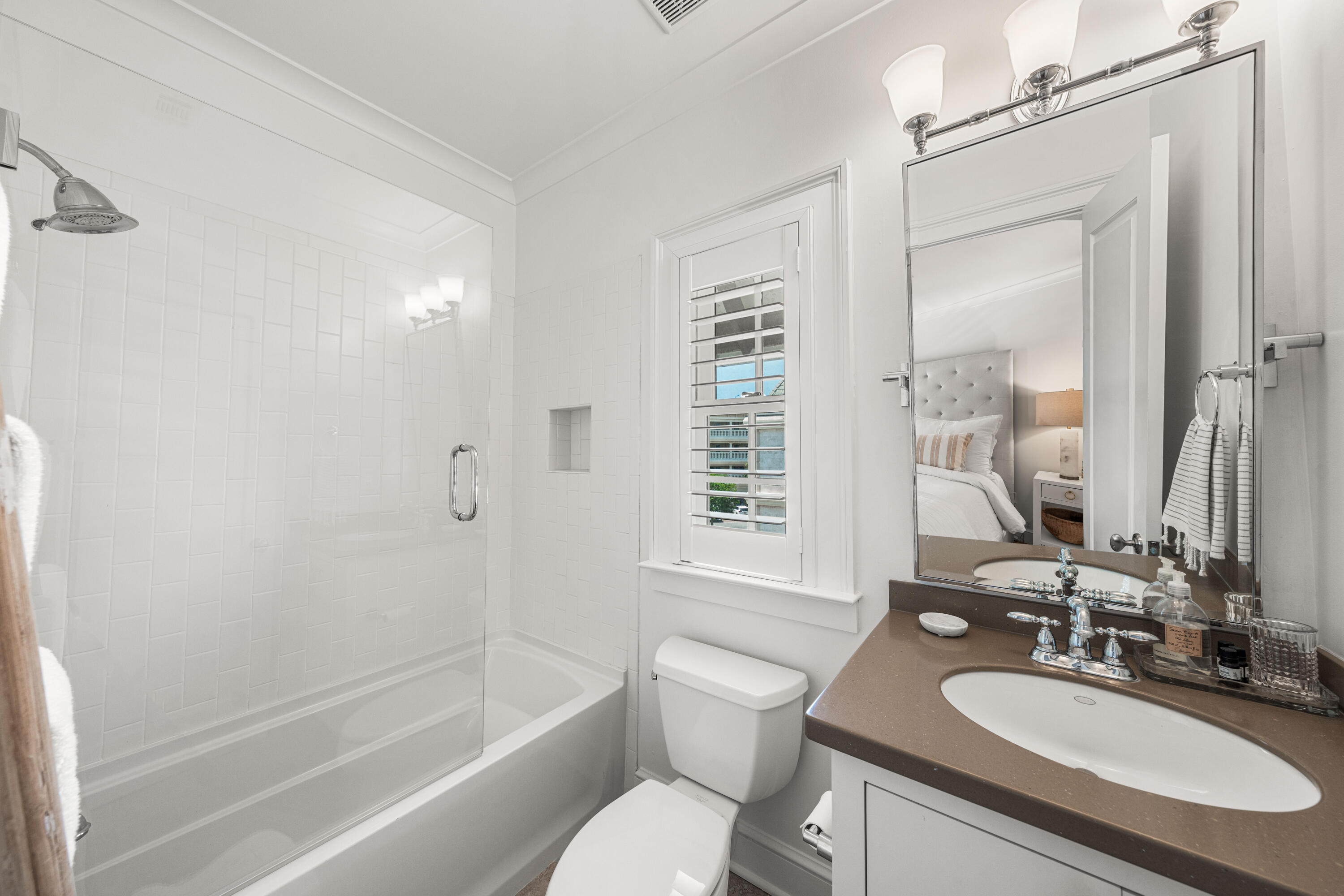 249 Lifeguard Loop East, Unit A3 Inlet Beach, FL 32461 - Photo 46 of 60 a bathroom with a sink toilet tub and shower