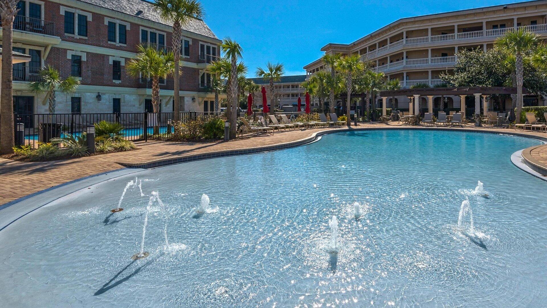 249 Lifeguard Loop East, Unit A3 Inlet Beach, FL 32461 - Photo 55 of 60 a view of building with swimming pool and sitting area