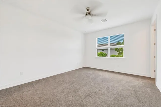 a bathroom with a toilet a sink and bathtub