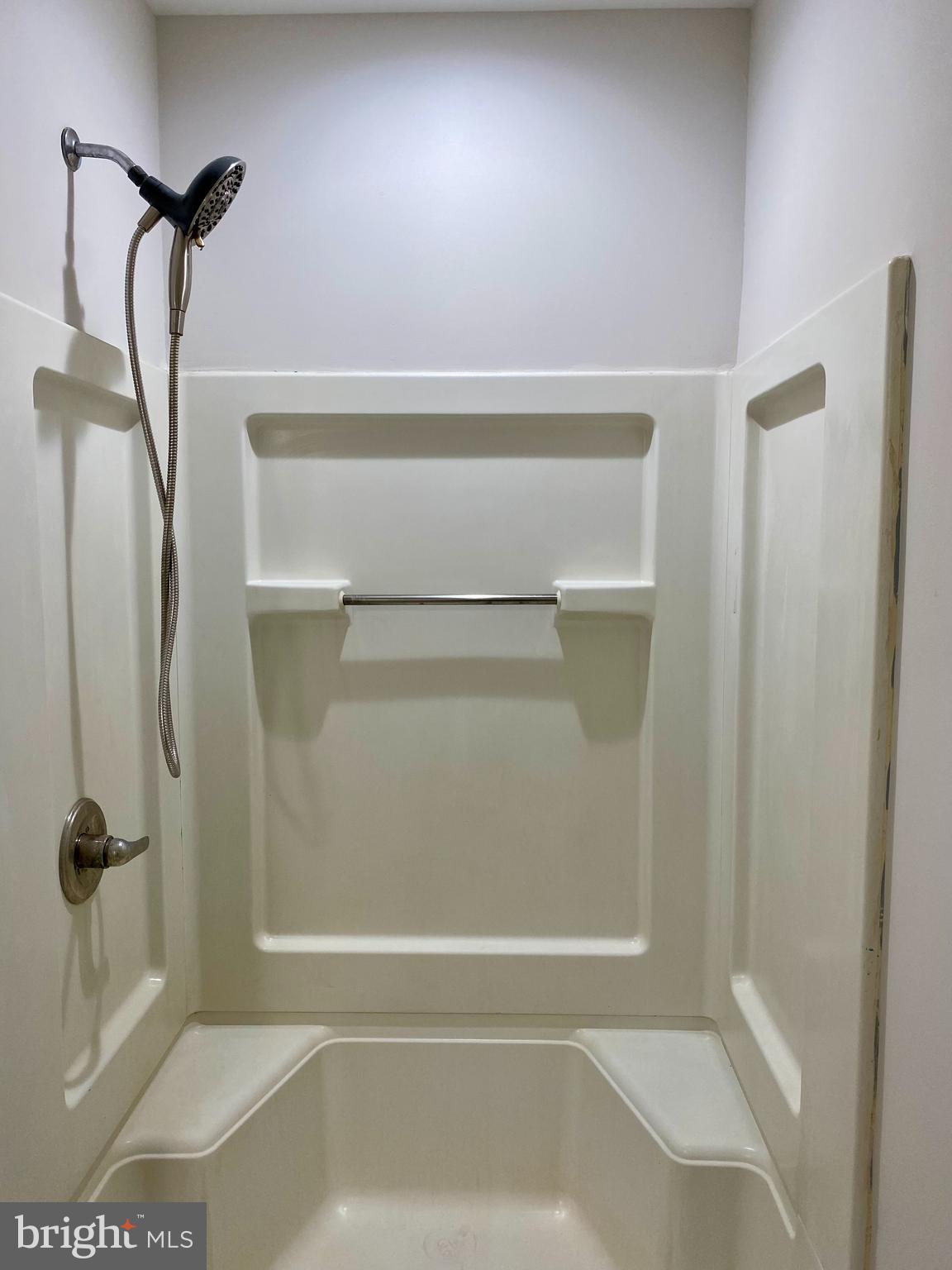 1297 Highway 40 Pilesgrove, NJ 08098 - Photo 22 of 32 a bathroom with a shower