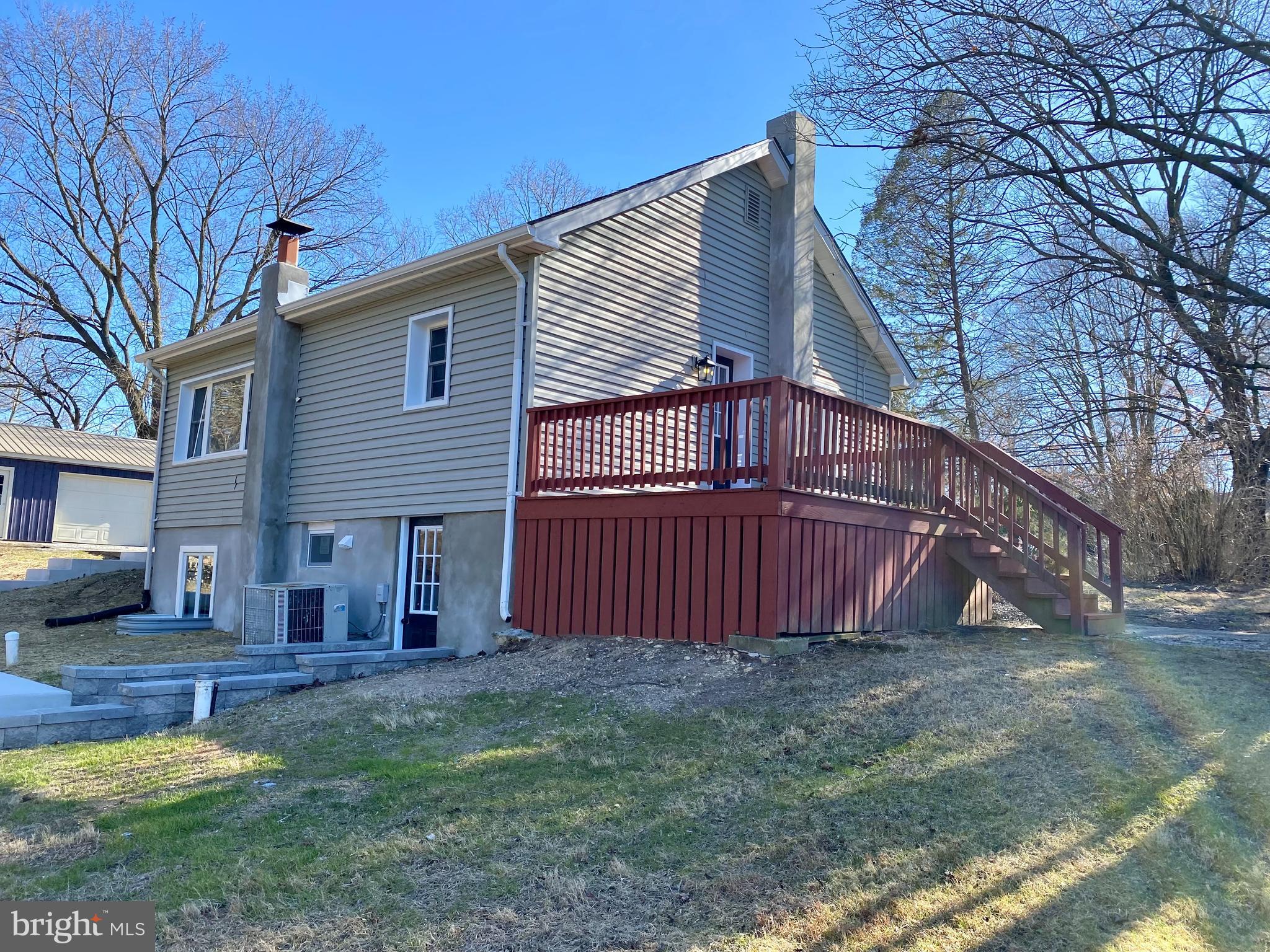 1297 Highway 40 Pilesgrove, NJ 08098 - Photo 26 of 32 a view of a house with a yard