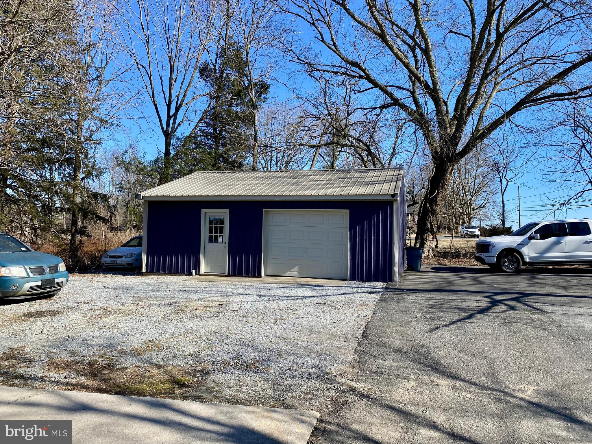 1297 Highway 40 Pilesgrove, NJ 08098 - Photo 28 of 32 a view of a house with a yard