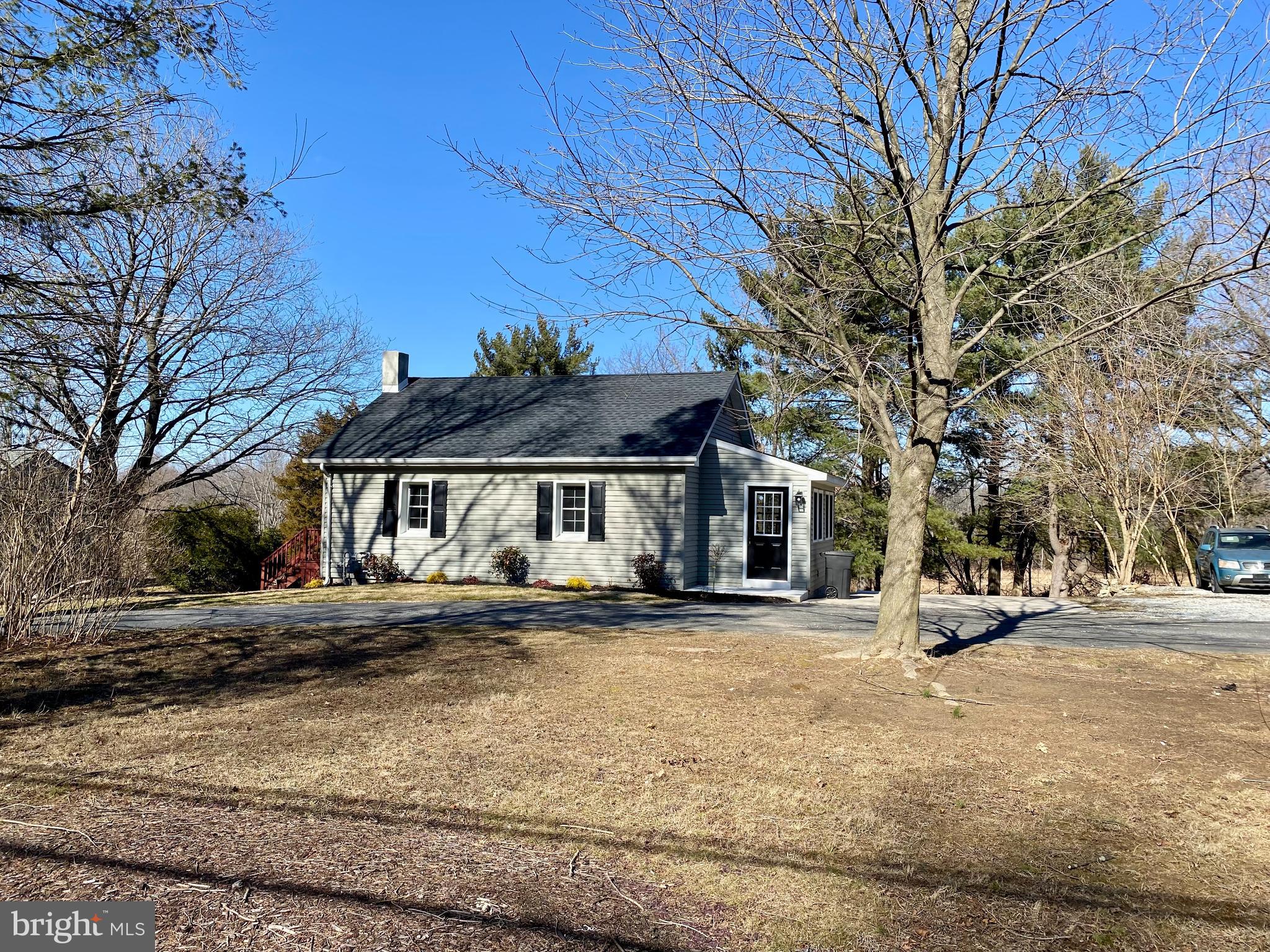 1297 Highway 40 Pilesgrove, NJ 08098 - Photo 4 of 32 a view of a town with large trees