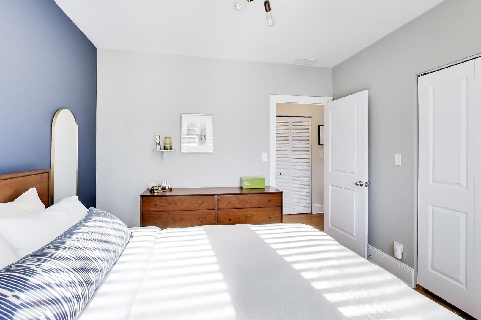 1424 West Cullom Avenue, Unit 3 Chicago, IL 60613 - Photo 14 of 18 a bedroom with a bed and a dresser