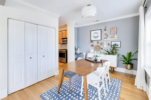 a view of a dining room with furniture