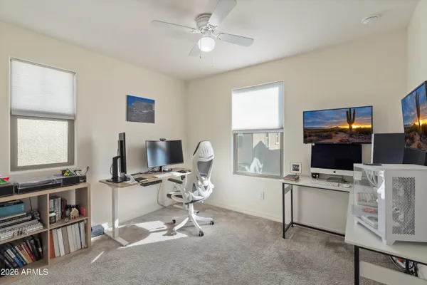 a view of a workspace with furniture