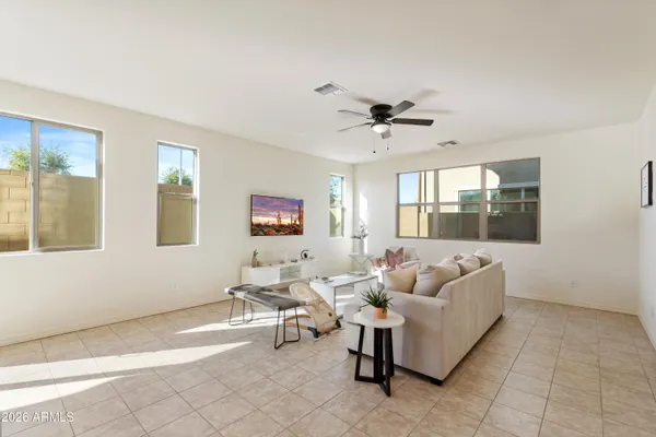 a living room with furniture and a window