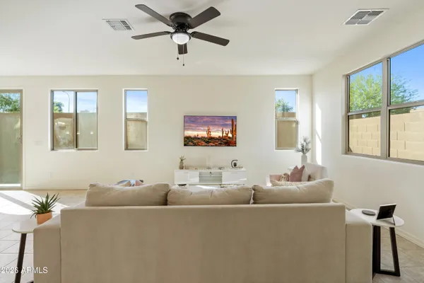 a living room with furniture and a window