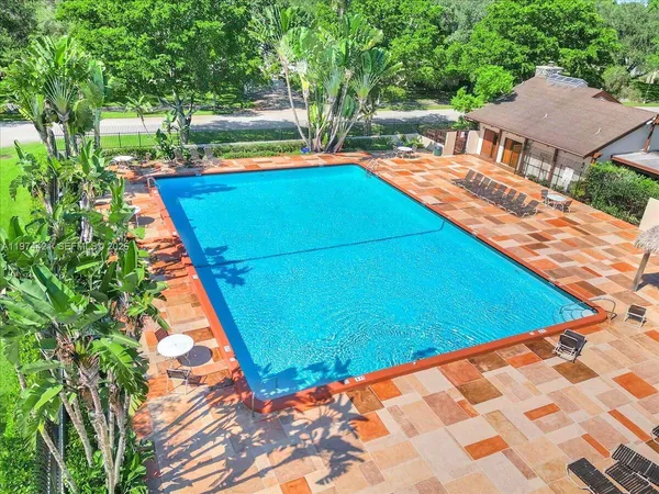 a view of an outdoor space and swimming pool