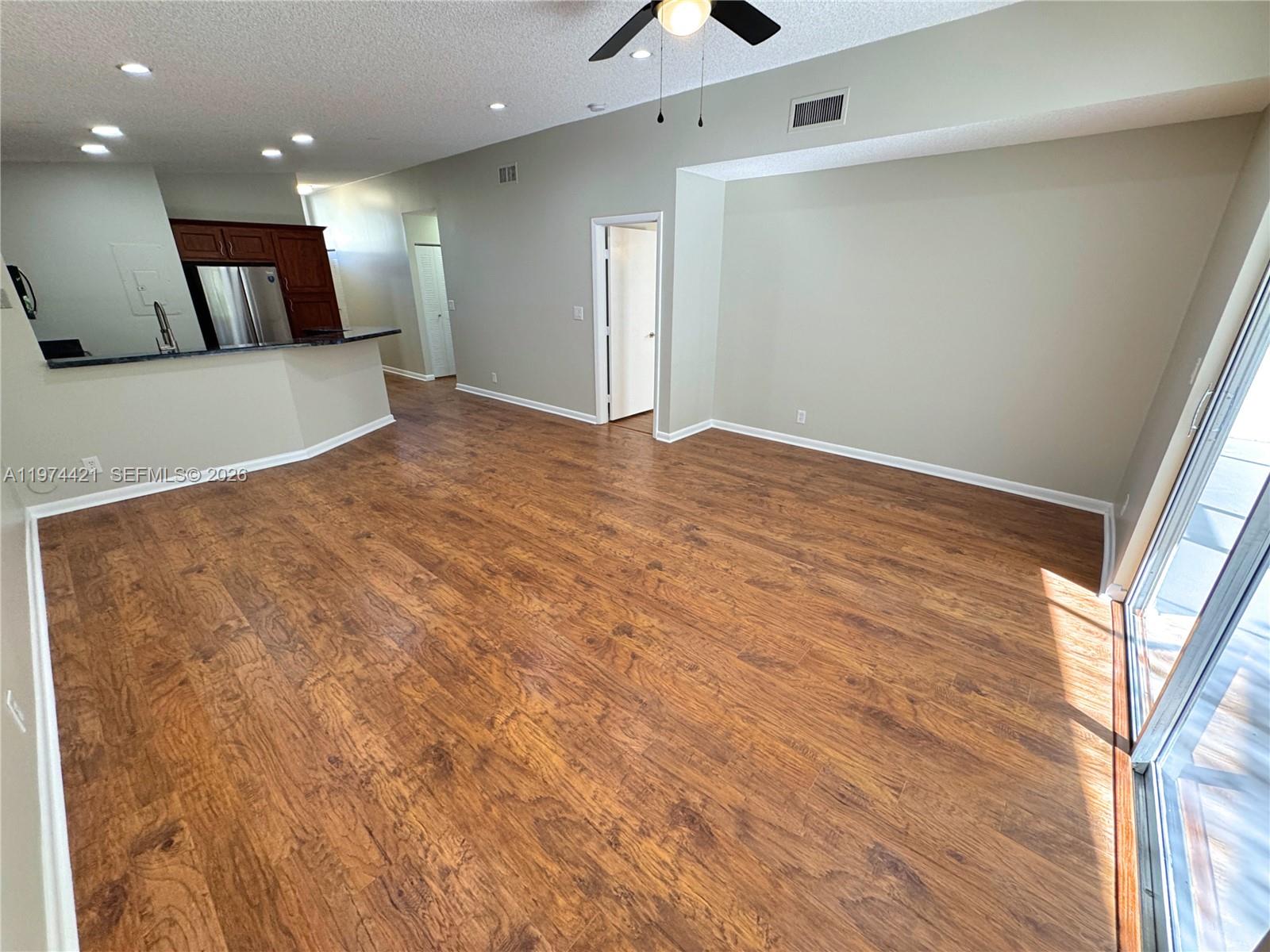 22278 Misty Woods Way Boca Raton, FL 33428 - Photo 4 of 20 a view of a hallway with a large window