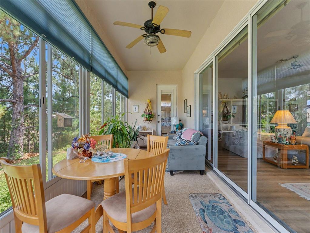 8910 Jericho Road Weeki Wachee, FL 34613 - Photo 43 of 52 a view of a dining room with furniture window and outside view