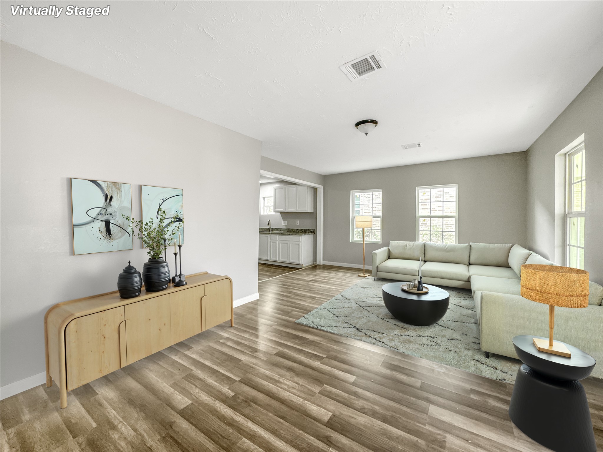 306 Armstrong Street Houston, TX 77029 - Photo 2 of 30 a living room with furniture and a potted plant