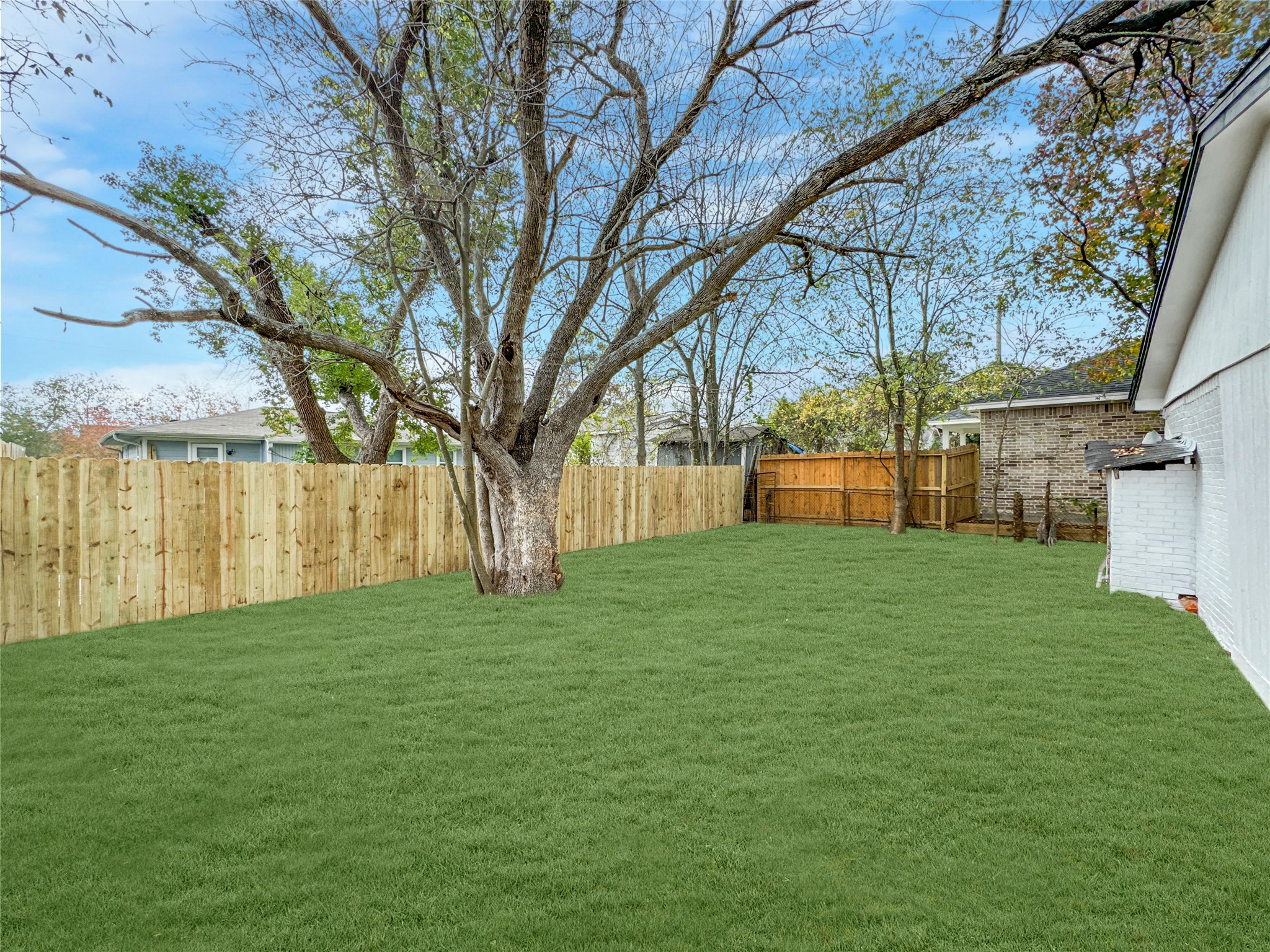 306 Armstrong Street Houston, TX 77029 - Photo 27 of 30 a view of a yard with a house
