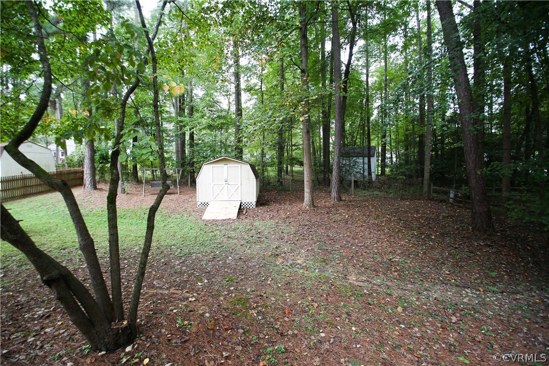 4524 Fordham Road North Chesterfield, VA 23236 - Photo 29 of 30 a backyard of a house with outdoor seating and entertaining space