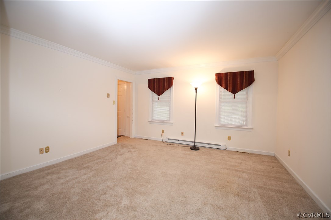 4524 Fordham Road North Chesterfield, VA 23236 - Photo 5 of 30 an empty room with wooden floor and windows