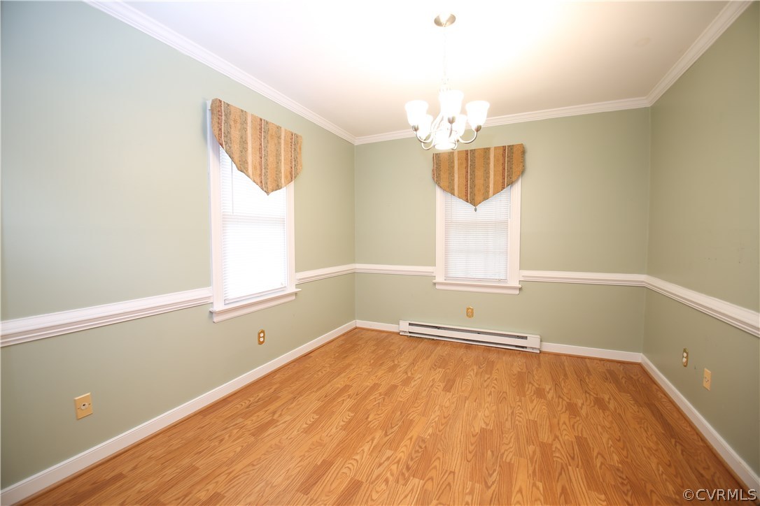 4524 Fordham Road North Chesterfield, VA 23236 - Photo 7 of 30 wooden floor in an empty room with a window