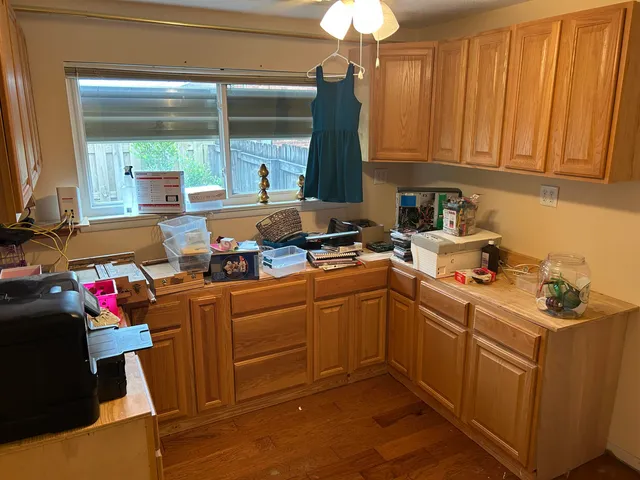 a room with sink washer and dryer