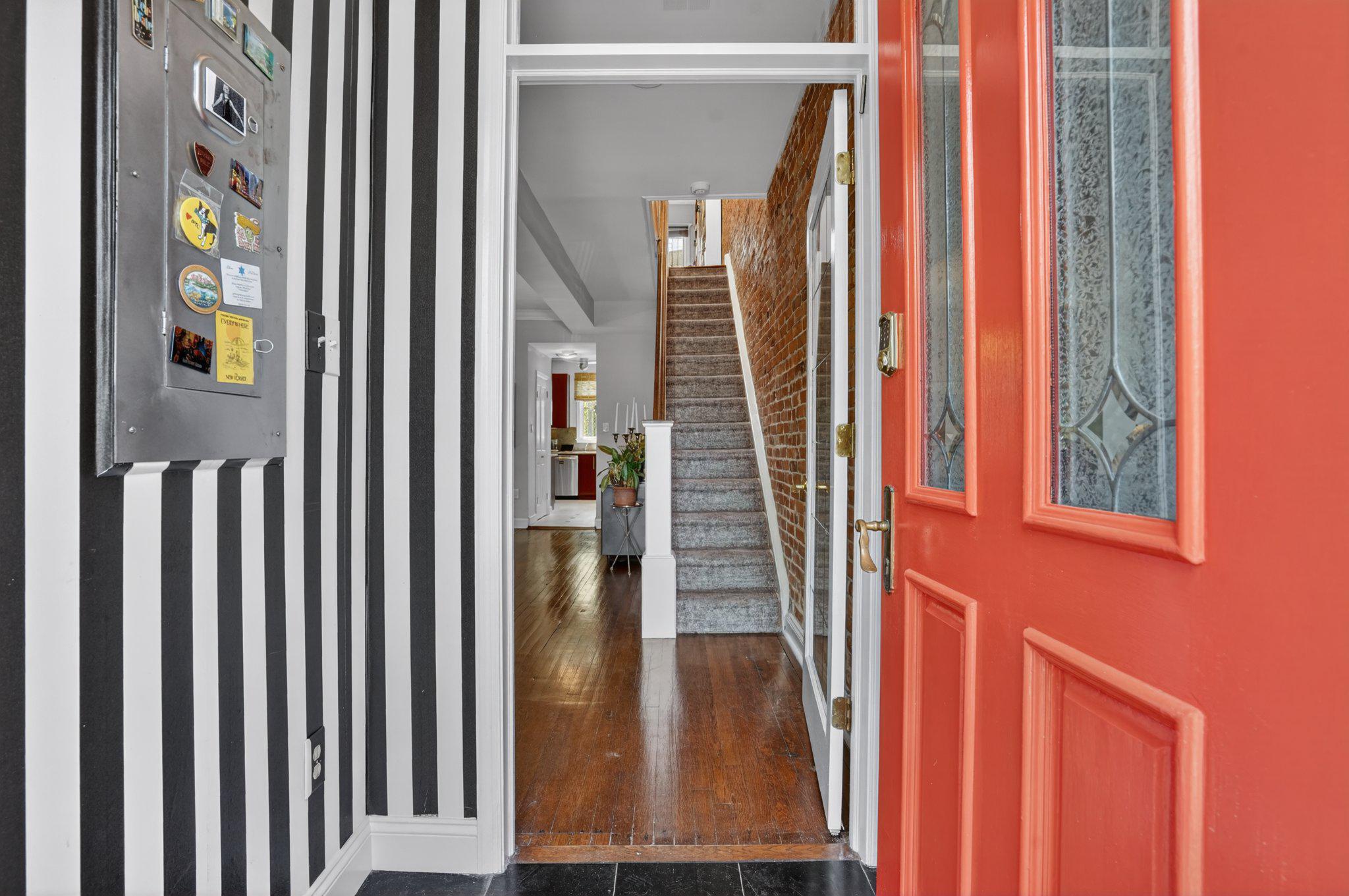 1233 E Street Southeast Washington, DC 20003 - Photo 2 of 37 Charming entryway with bold accents.
