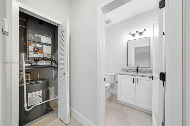 a view of a balcony with couches and ocean view