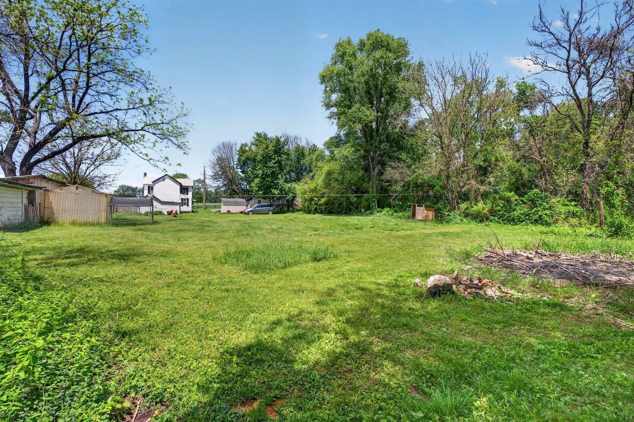 724 Newtown Road Elkton, VA 22827 - Photo 37 of 38 a backyard of a house with lots of green space