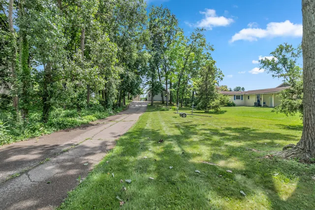 $464,900 | 10911 Woodbrook Drive, Cement City, MI 49233