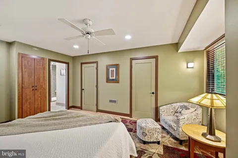 a bathroom with a shower and toilet