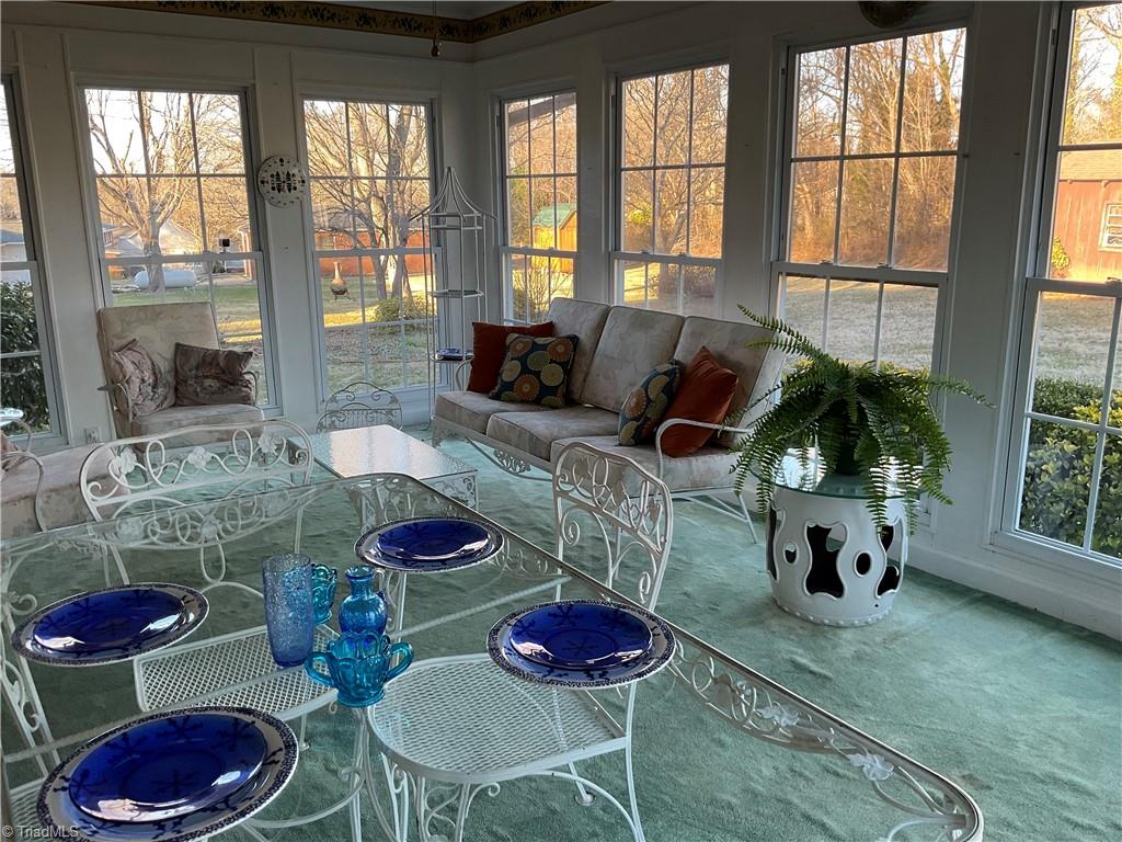 623 Lakeview Drive Thomasville, NC 27360 - Photo 14 of 33 Just imagine coming home and relaxing in this spacious sunroom - read a book, entertain or just take a nap.. such a great space.