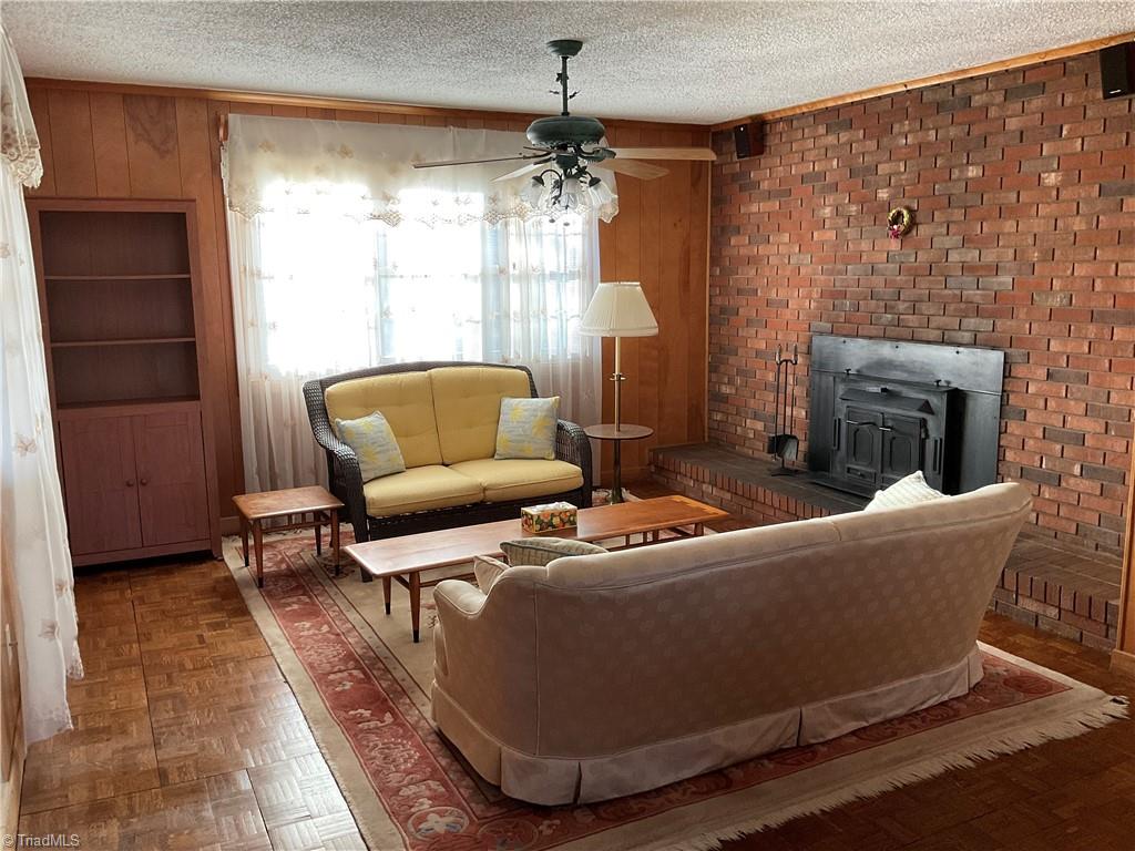 623 Lakeview Drive Thomasville, NC 27360 - Photo 17 of 33 Cozy up in front of this fireplace.