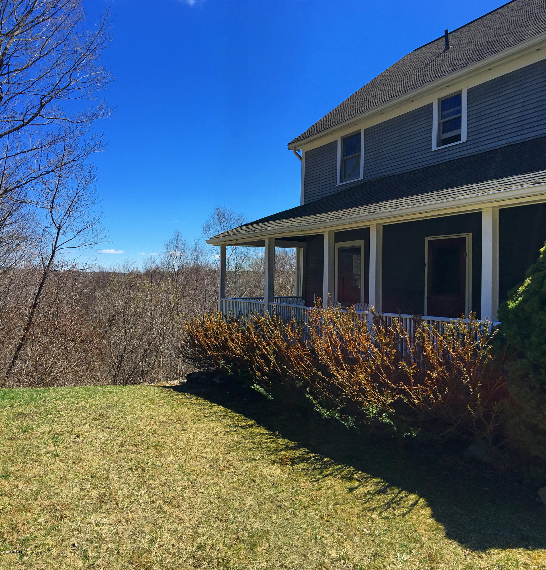 171 Schultz Road Washington, MA 01223 - Photo 1 of 27 a front view of a house with a garden
