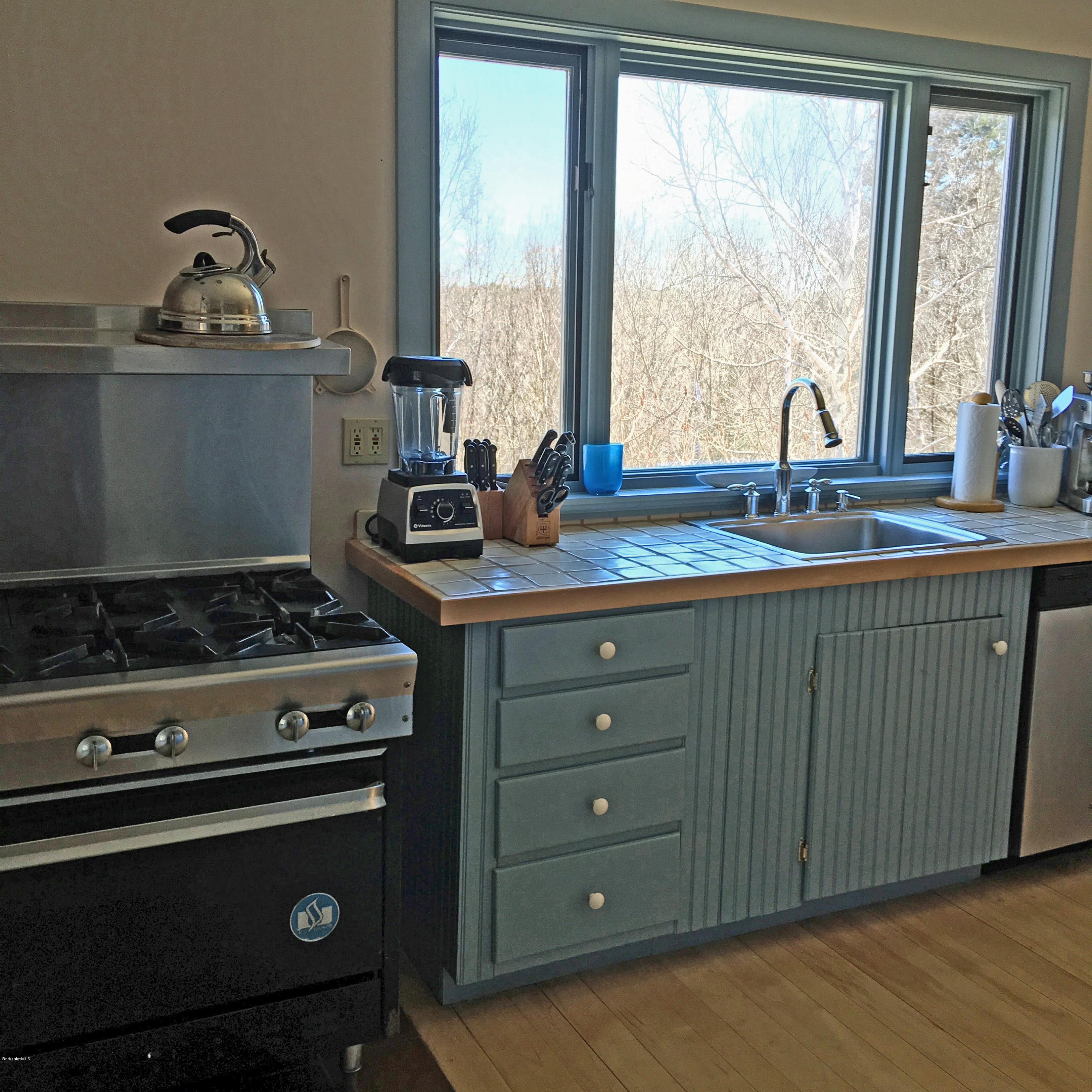 171 Schultz Road Washington, MA 01223 - Photo 11 of 27 a kitchen with a stove and a sink