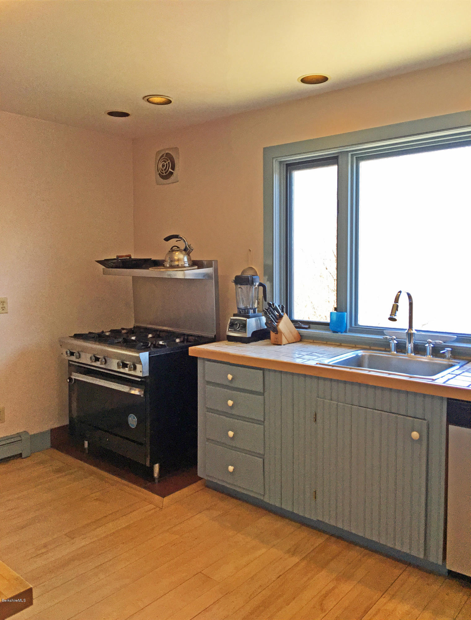 171 Schultz Road Washington, MA 01223 - Photo 12 of 27 a kitchen with a stove and a sink