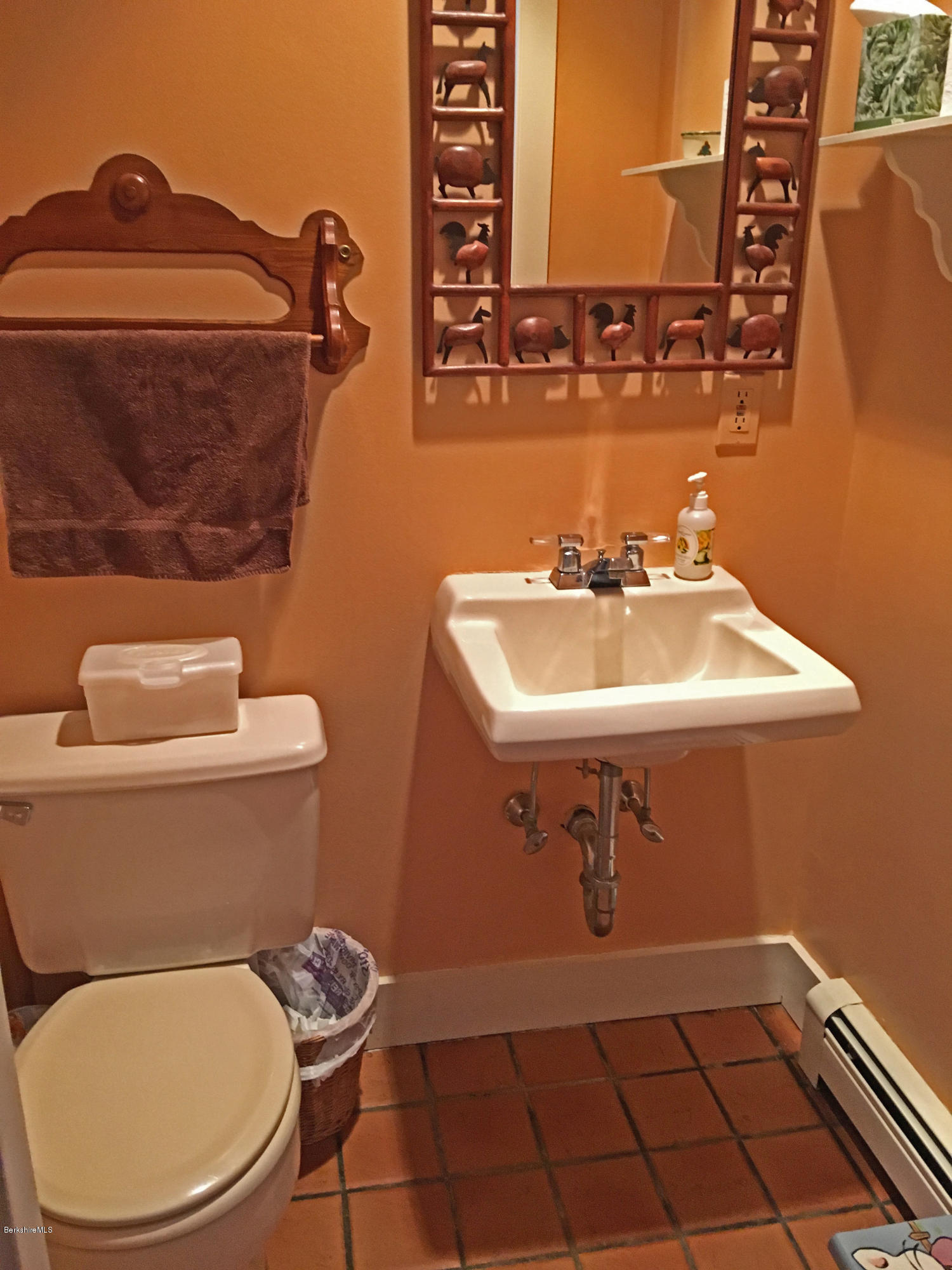 171 Schultz Road Washington, MA 01223 - Photo 14 of 27 a bathroom with a toilet a sink and mirror