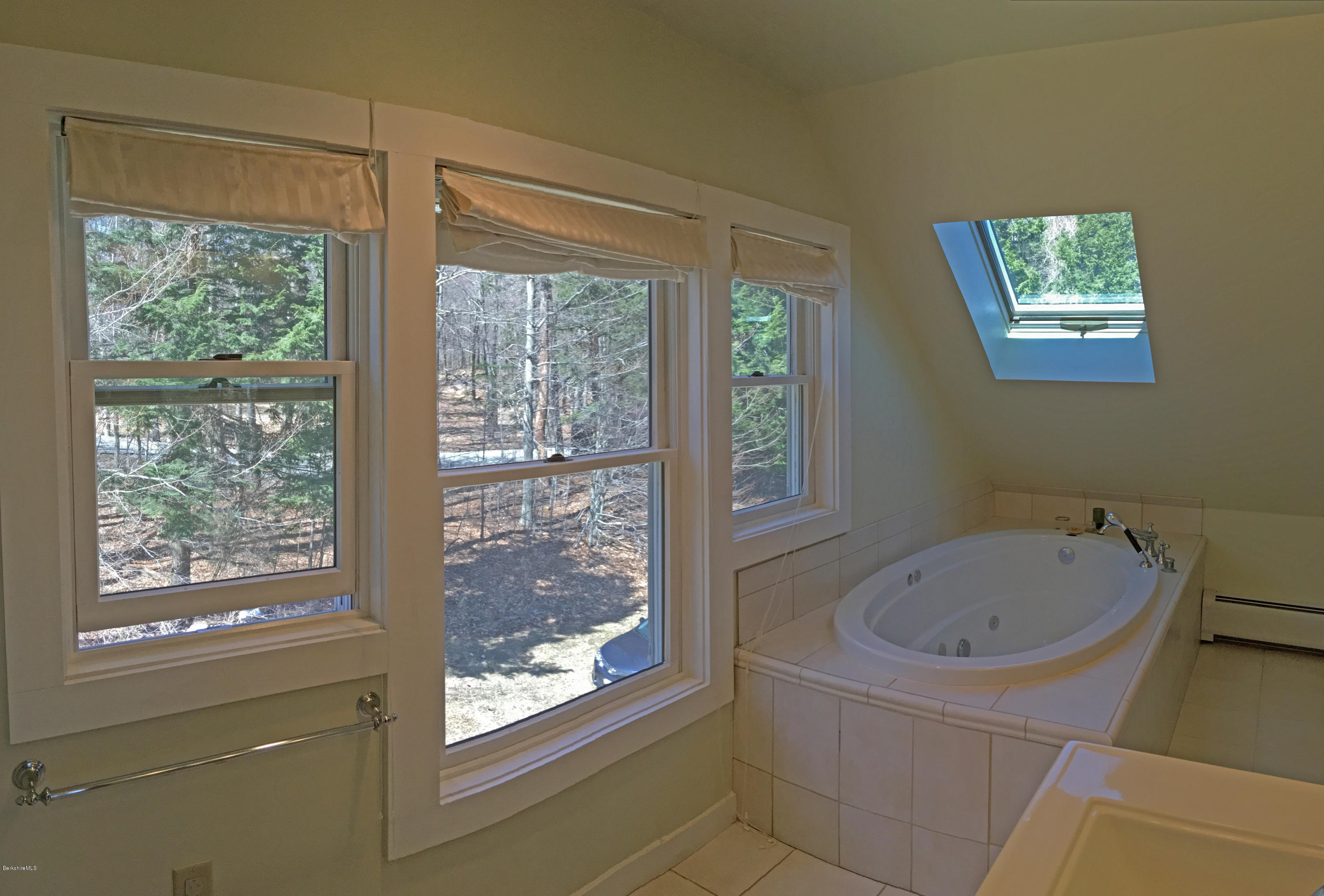 171 Schultz Road Washington, MA 01223 - Photo 16 of 27 a bathroom with a bathtub and a shower