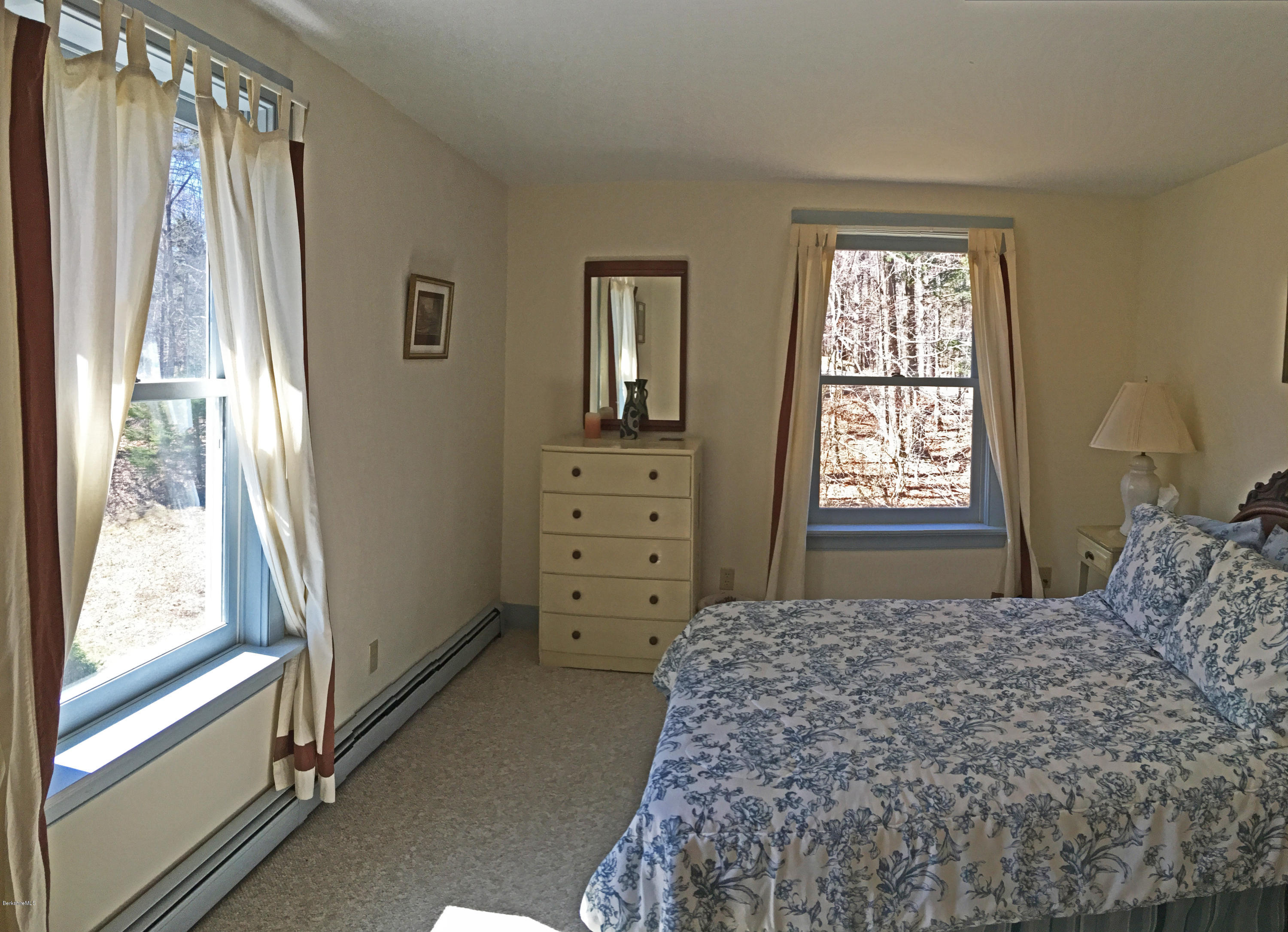 171 Schultz Road Washington, MA 01223 - Photo 18 of 27 a bedroom with a bed and a window