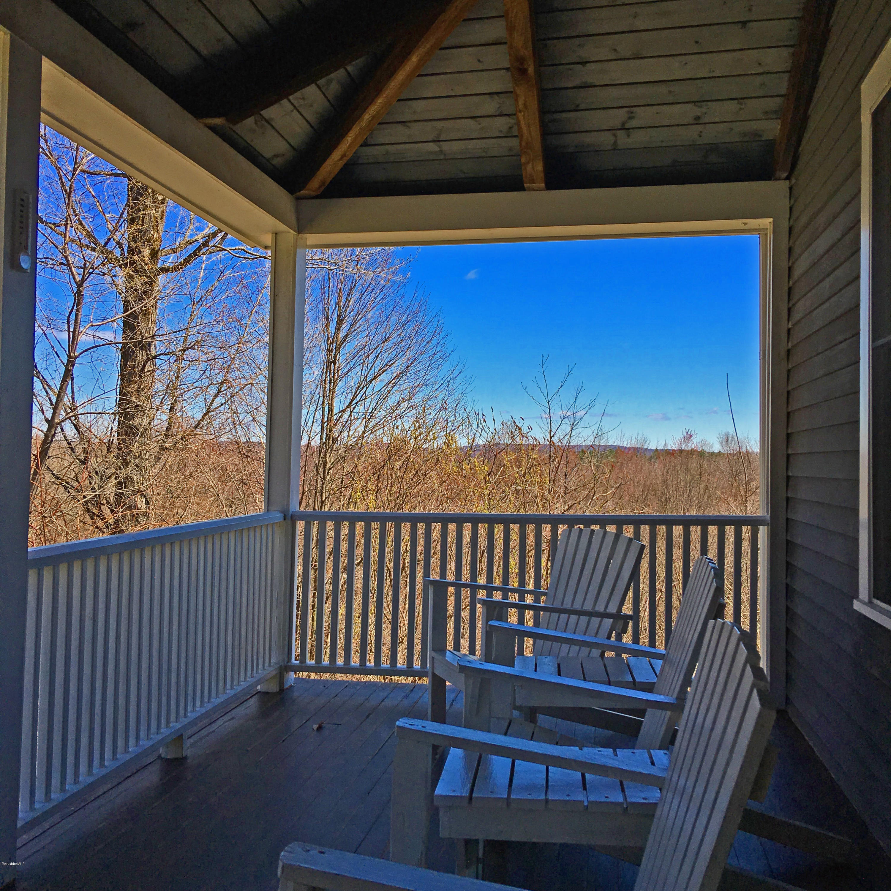 171 Schultz Road Washington, MA 01223 - Photo 3 of 27 a view of balcony with wooden floor