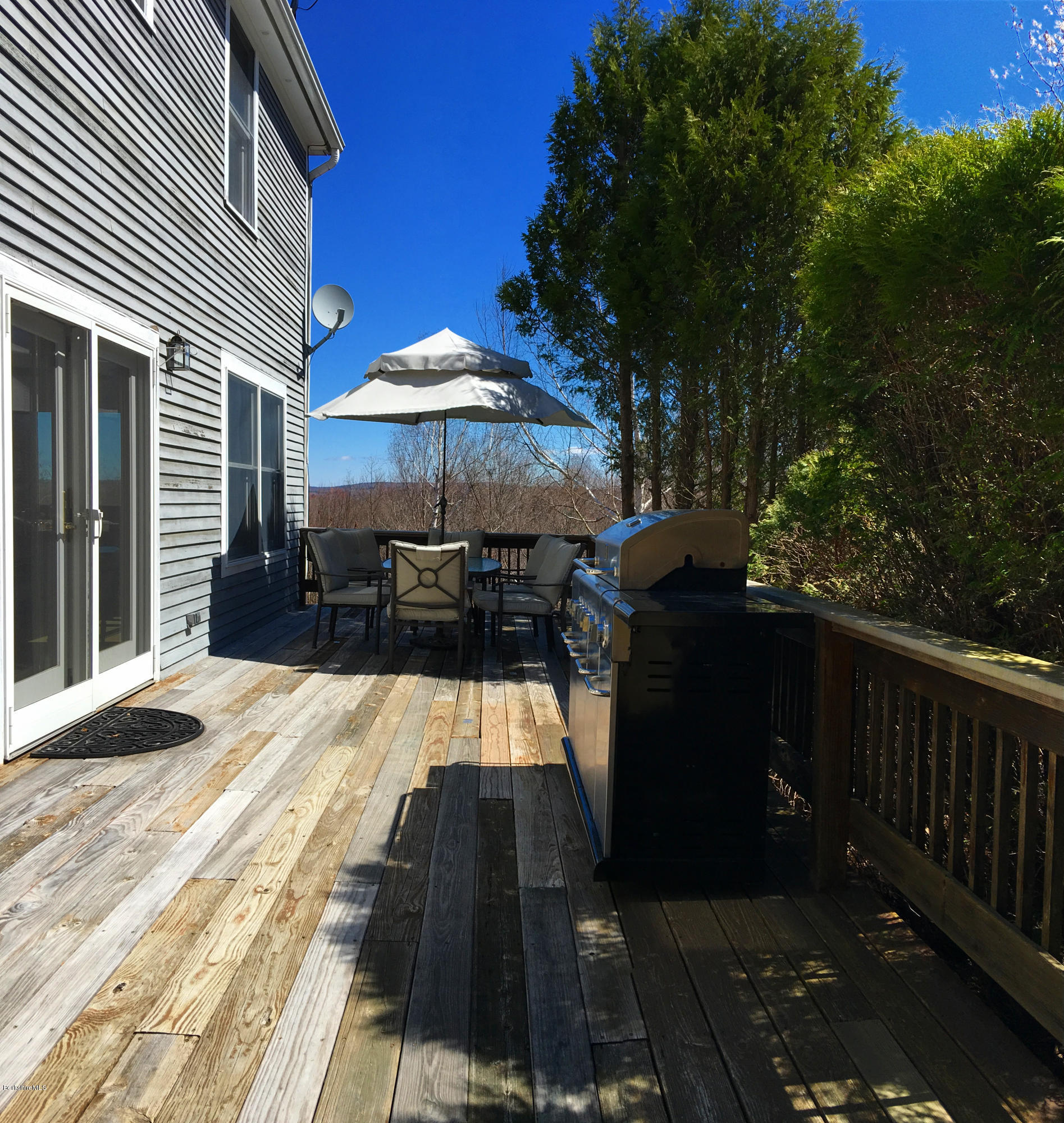 171 Schultz Road Washington, MA 01223 - Photo 24 of 27 a view of a patio with wooden fencing