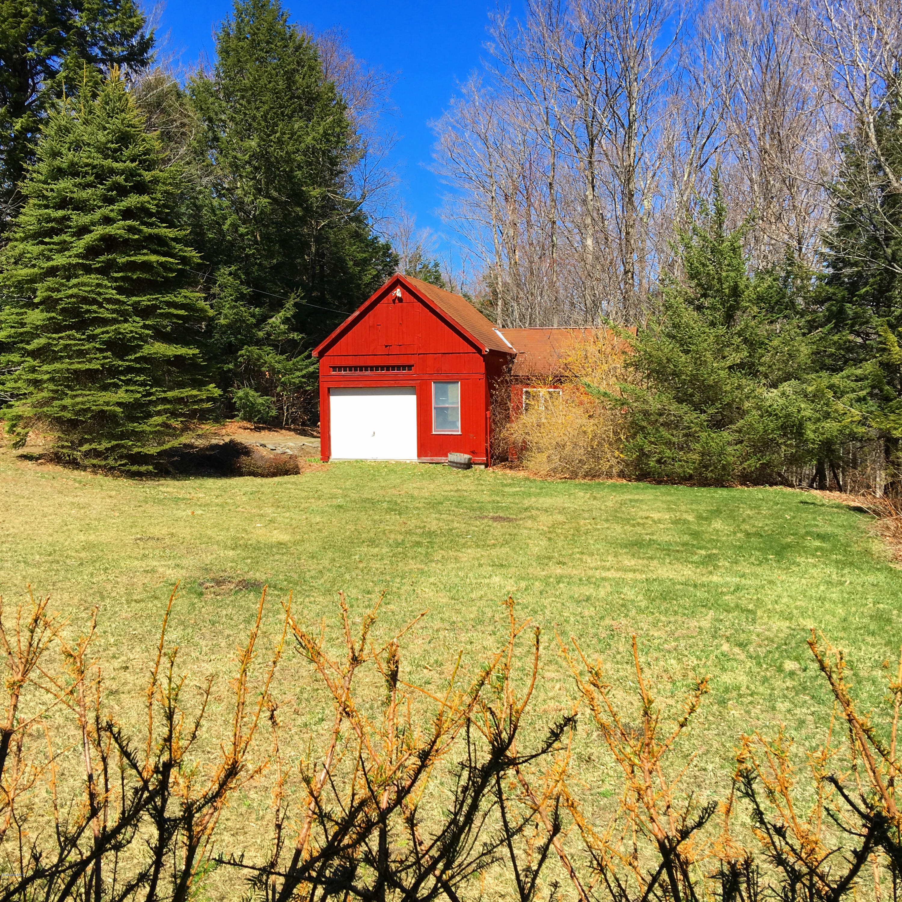171 Schultz Road Washington, MA 01223 - Photo 5 of 27 a view of a yard with a tree