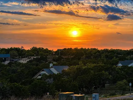 a view of a city with sunset view